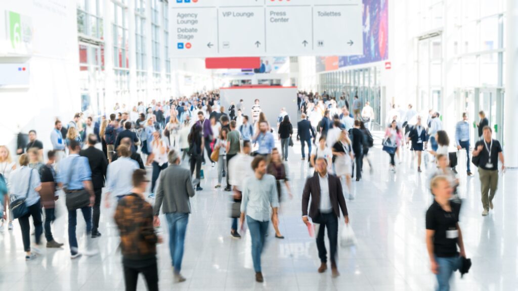 blurred business people at a trade fair